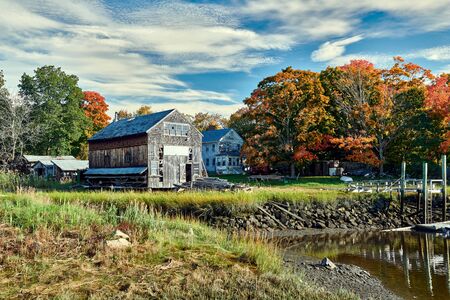 Fall in Essex, Massachusetts, USA. Autumn scene at old wharf.の写真素材