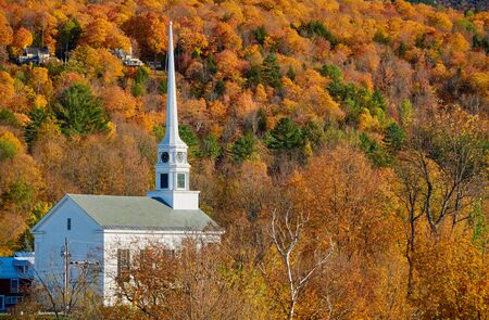 Iconic New England church in Stowe town at autumn in Vermont, USAの写真素材