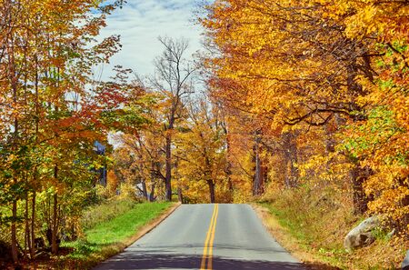 Highway at autumn day in Vermont, USA.の写真素材