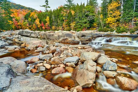 Swift River cascades at autumn in White Mountain National Forest, New Hampshire, USA. Fall in New England.の写真素材