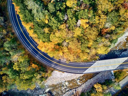 Scenic Mohawk Trail winding highway at autumn, Massachusetts, USA. Fall in New England. Aerial drone shot.の写真素材