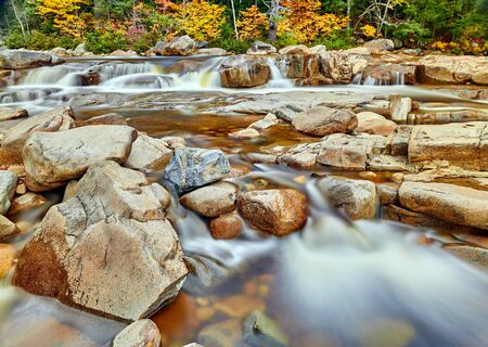 Swift River cascades at autumn in White Mountain National Forest, New Hampshire, USA. Fall in New England.の写真素材