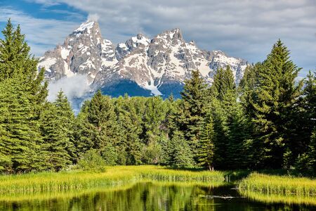 Grand Teton Mountains from Schwabacher's Landing on the Snake River at morning. Grand Teton National Park, Wyoming, USA.の写真素材