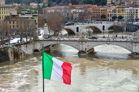 Rome and Tiber river with high water in February and flag of Italyのeditorial素材
