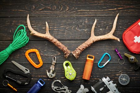 Travel items for hiking tourism still life over wooden backgroundの写真素材