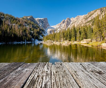 Dream Lake and reflection with mountains in snow around at autumn. Rocky Mountain National Park in Colorado, USA.の写真素材