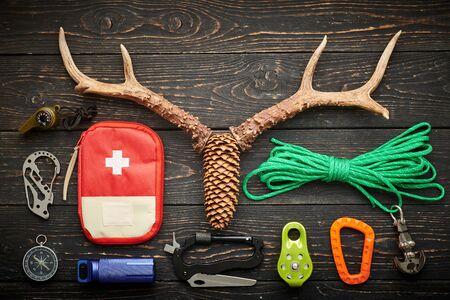 Travel items for hiking tourism still life over wooden backgroundの写真素材