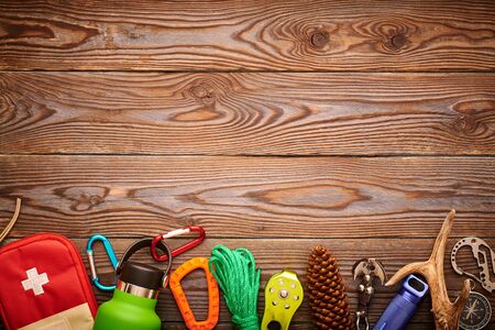 Travel items for hiking tourism still life over wooden backgroundの写真素材