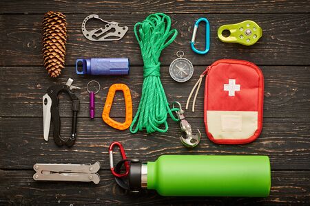 Travel items for hiking tourism still life over wooden backgroundの写真素材