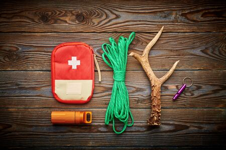 Travel items for hiking tourism still life over wooden backgroundの写真素材