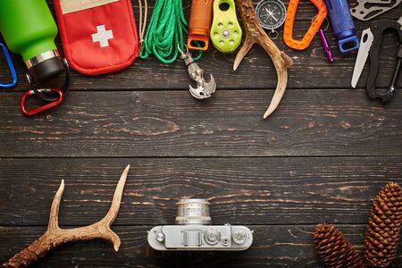Travel items for hiking tourism still life over wooden backgroundの写真素材