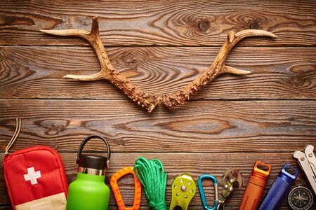 Travel items for hiking tourism still life over wooden backgroundの写真素材