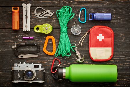 Travel items for hiking tourism still life over wooden backgroundの写真素材