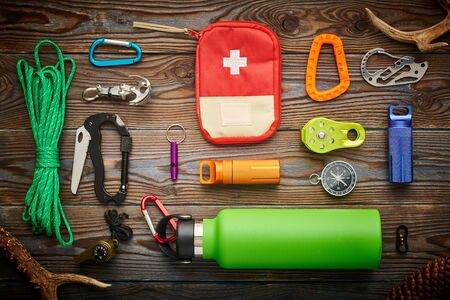 Travel items for hiking tourism still life over wooden backgroundの写真素材