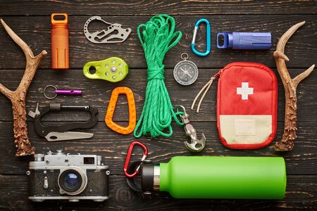 Travel items for hiking tourism still life over wooden backgroundの写真素材