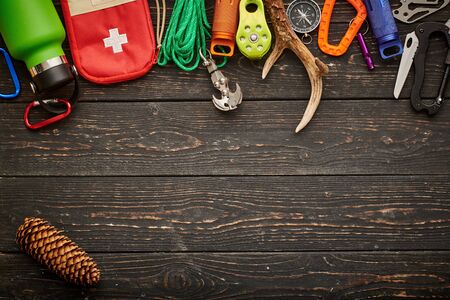 Travel items for hiking tourism still life over wooden backgroundの写真素材