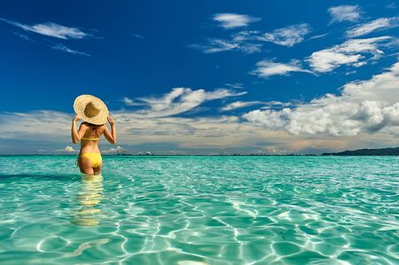 Girl on a tropical beach at Philippinesの写真素材