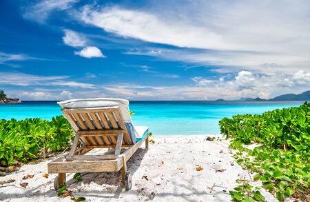 Beautiful Petite Anse beach with sun bed at Seychelles, Maheの写真素材