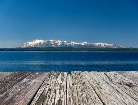 Yellowstone Lake with mountains landscape, Wyoming, USAの写真素材