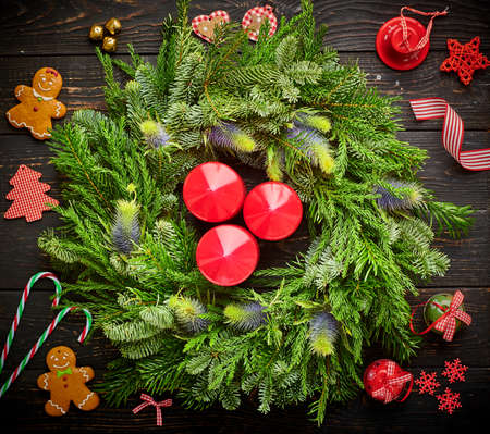 Christmas wreath on dark rustic wooden backgroundの写真素材