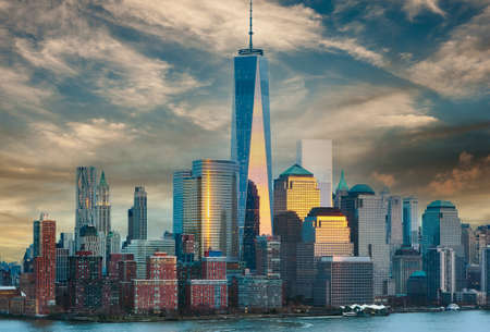 New York City Manhattan skyline at sunset over Hudson River viewed from New Jerseyの写真素材