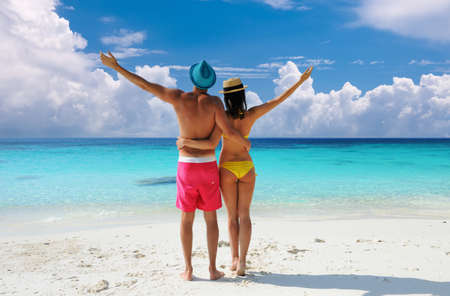 Couple on a tropical beach. Perhentian islands, Malaysia.の写真素材