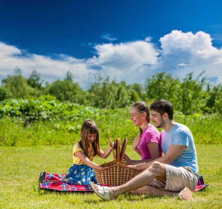 Family on picnic at sunny dayの写真素材