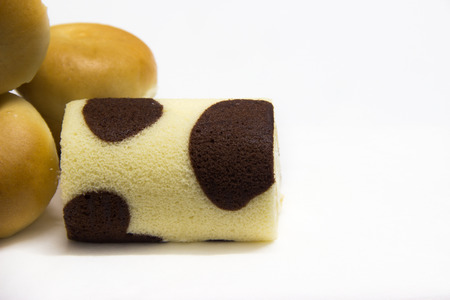 Sweet of milk chocolate roll and bread.の写真素材
