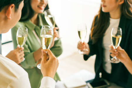 Asian business people are holding a year-end party together