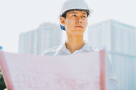 Asian construction engineers are doing experimental tests at the siteの写真素材