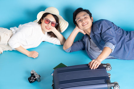 Young Asian couple happily traveling togetherの写真素材
