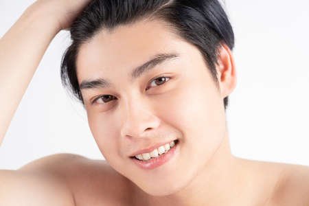 closeup young asian handsome man face