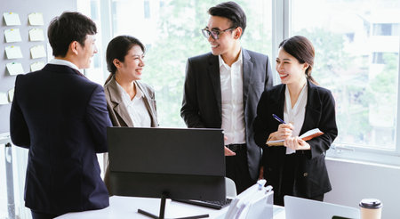 Everyone gets together to discuss ideas for the upcoming planの写真素材
