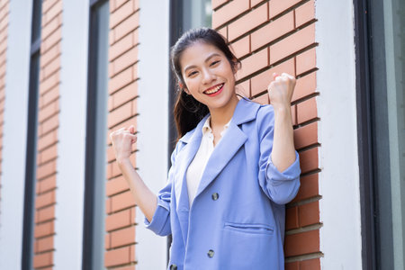 Young Asian woman working outsideの写真素材
