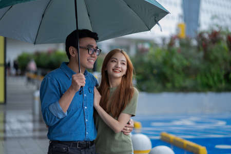 Asian couple shopping at the mall