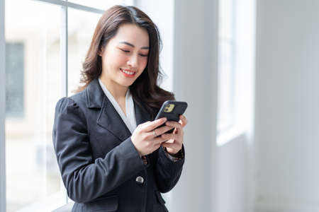 Young Asian businesswoman working at officeの写真素材