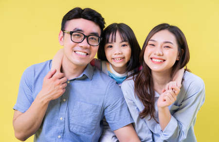 Image of young Asian family playing together at parkの写真素材