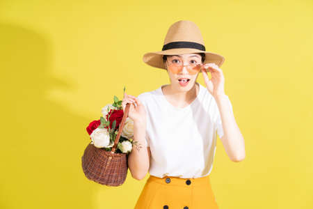 Photo of young Asian woman holding water bottleの写真素材