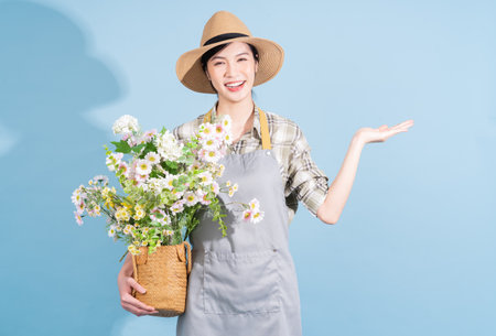 Portrait of young Asian female farmerの写真素材