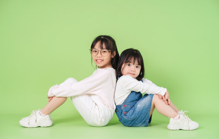 Image of young Asian child on background