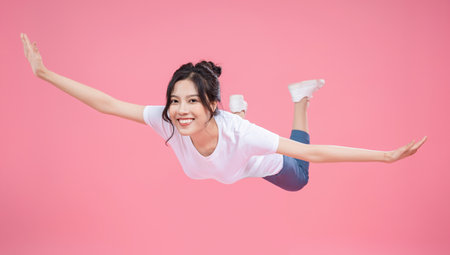 Young Asian woman on backgroundの写真素材