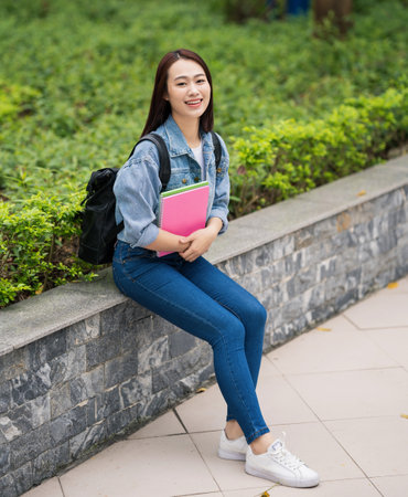 Young Asian student at schoolの写真素材
