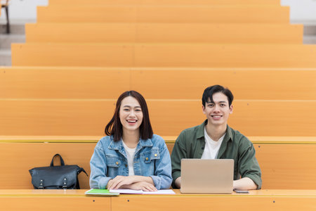Young Asian couple in the classroomの写真素材