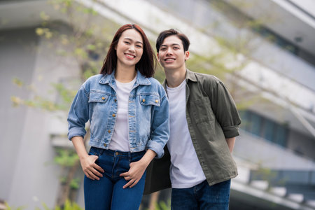 Photo of young Asian couple outdoorの写真素材