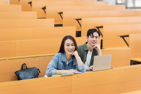 Young Asian couple in the classroomの写真素材