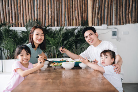Image of Asian family eating lunch togetherの写真素材