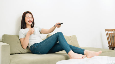 Image of young Asian woman at homeの写真素材