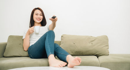 Image of young Asian woman at homeの写真素材