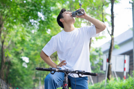 Portrait of young Asian man outsideの写真素材
