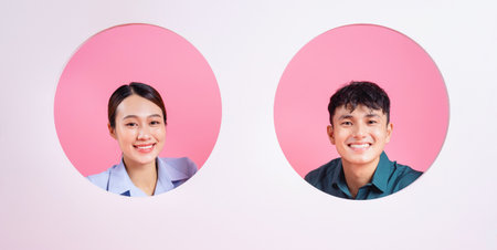 Photo of young Asian couple on backgroundの写真素材